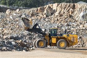 Penn/MD Quarry: A John Deere 944X loader prepares to load a haul truck with shot rock. 